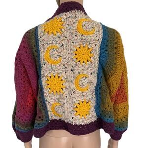 Colorful Crochet Sweater with Sun and Moon Design
